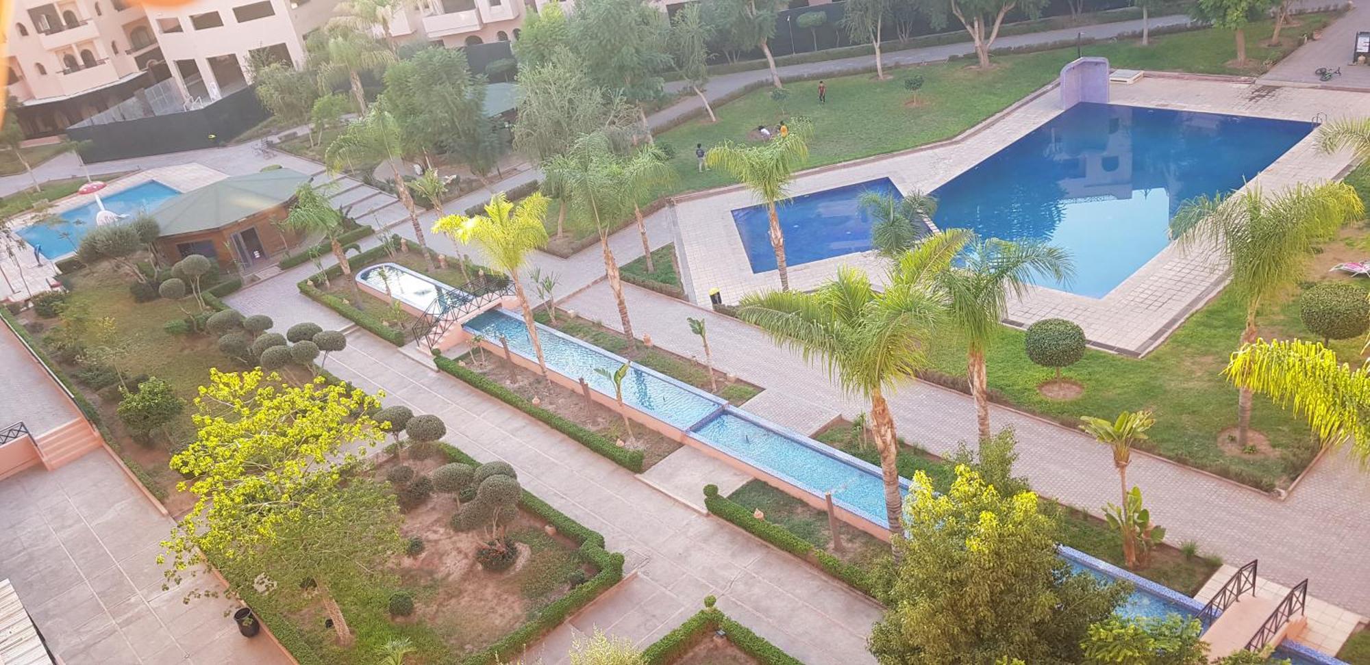 Un Moderne Chic Appartement Vue Sur Piscine Marrakesh Exterior foto