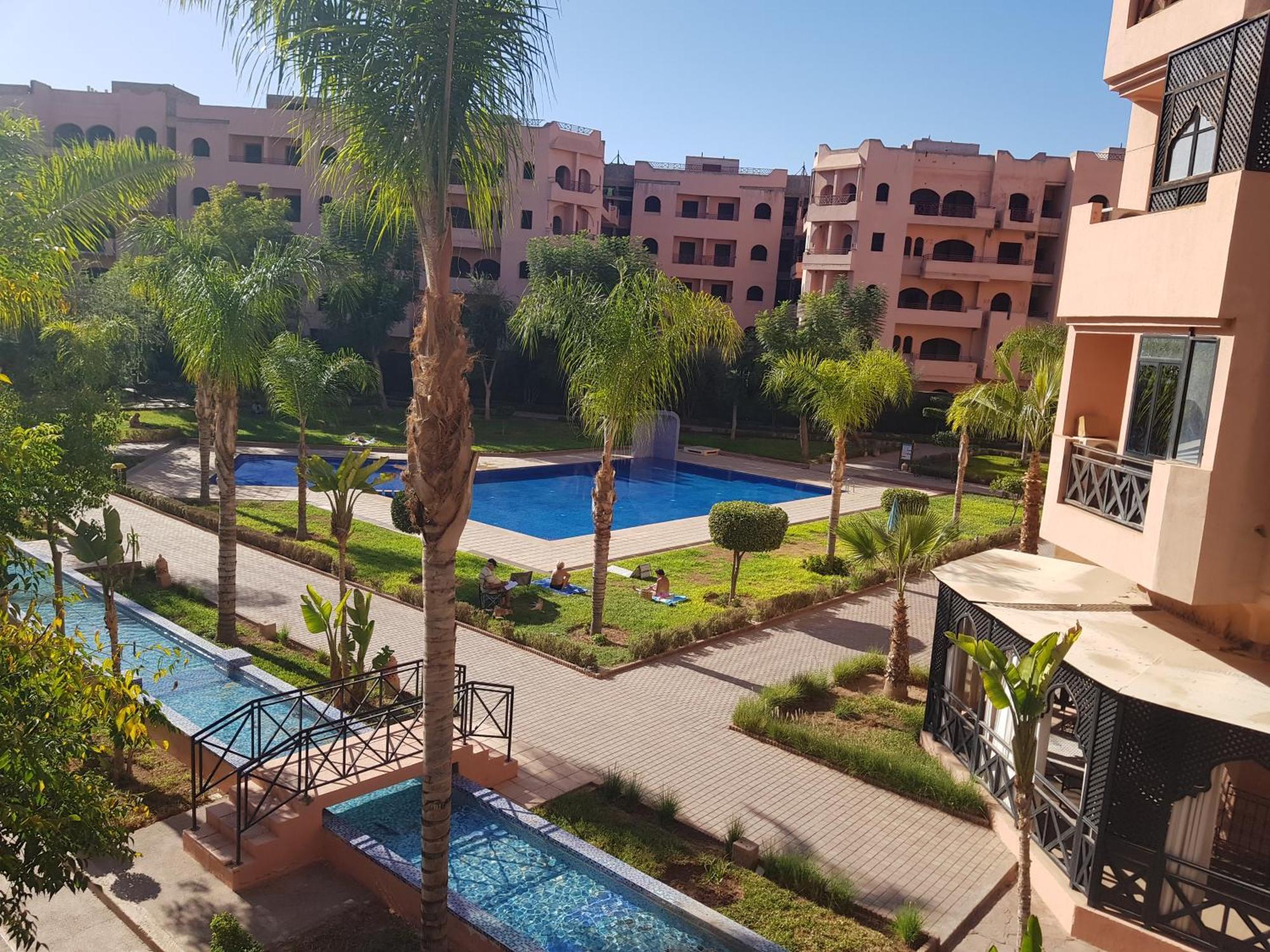 Un Moderne Chic Appartement Vue Sur Piscine Marrakesh Exterior foto